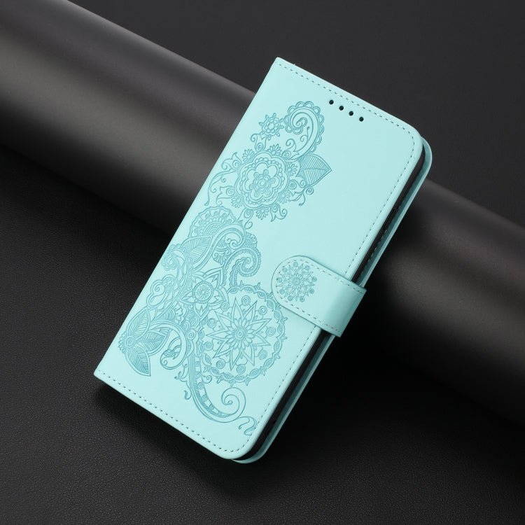 For Google Pixel 9 Datura Flower Embossed Flip Leather Phone Case(Light blue) - Google Cases by buy2fix | Online Shopping UK | buy2fix